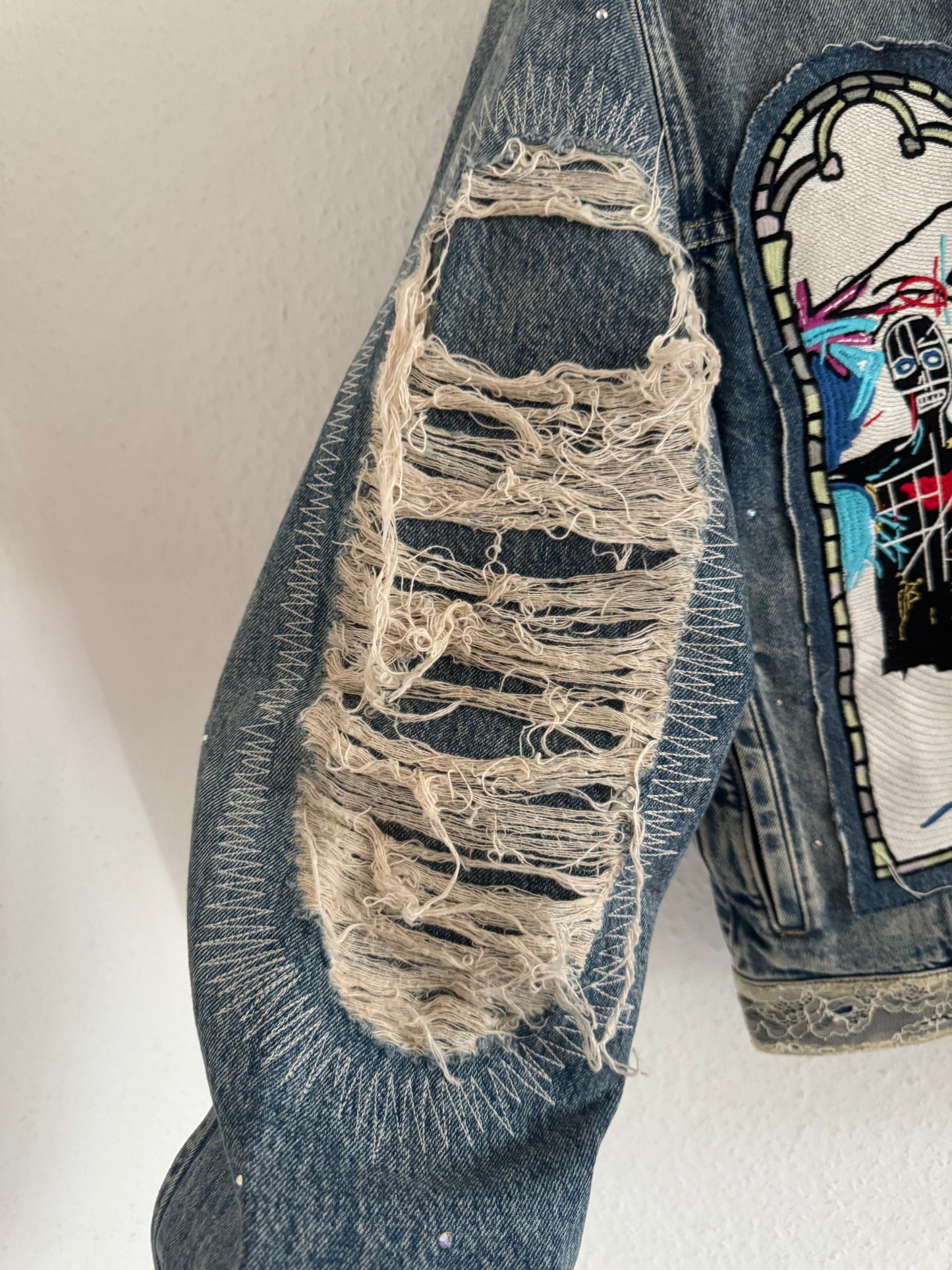 H&M × Jean-Michel Basquiat × Who Decides War Distressed Rhinestone Denim Jacket