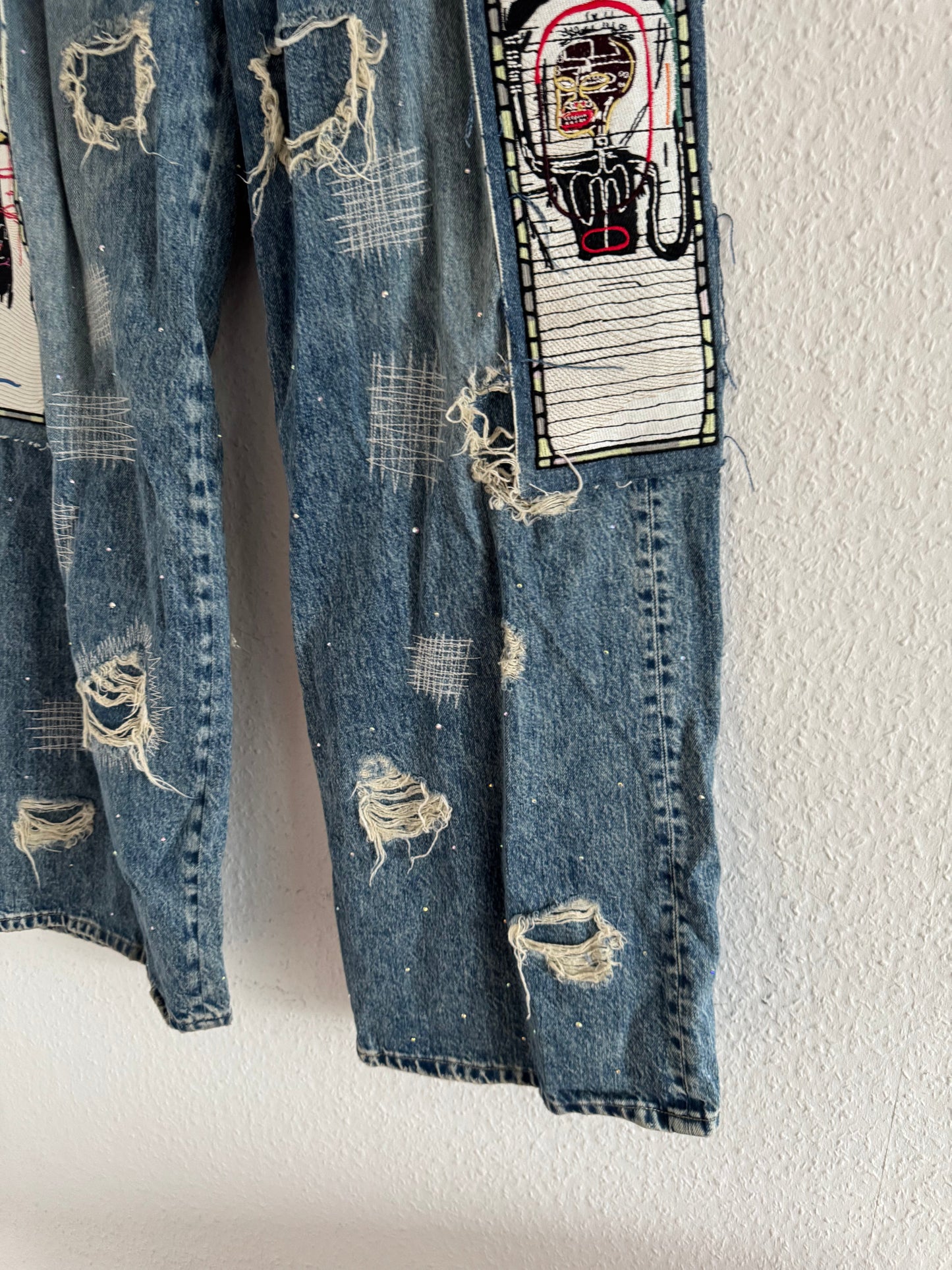H&M × Jean-Michel Basquiat × Who Decides War Distressed Rhinestone Graphic Denim Jeans