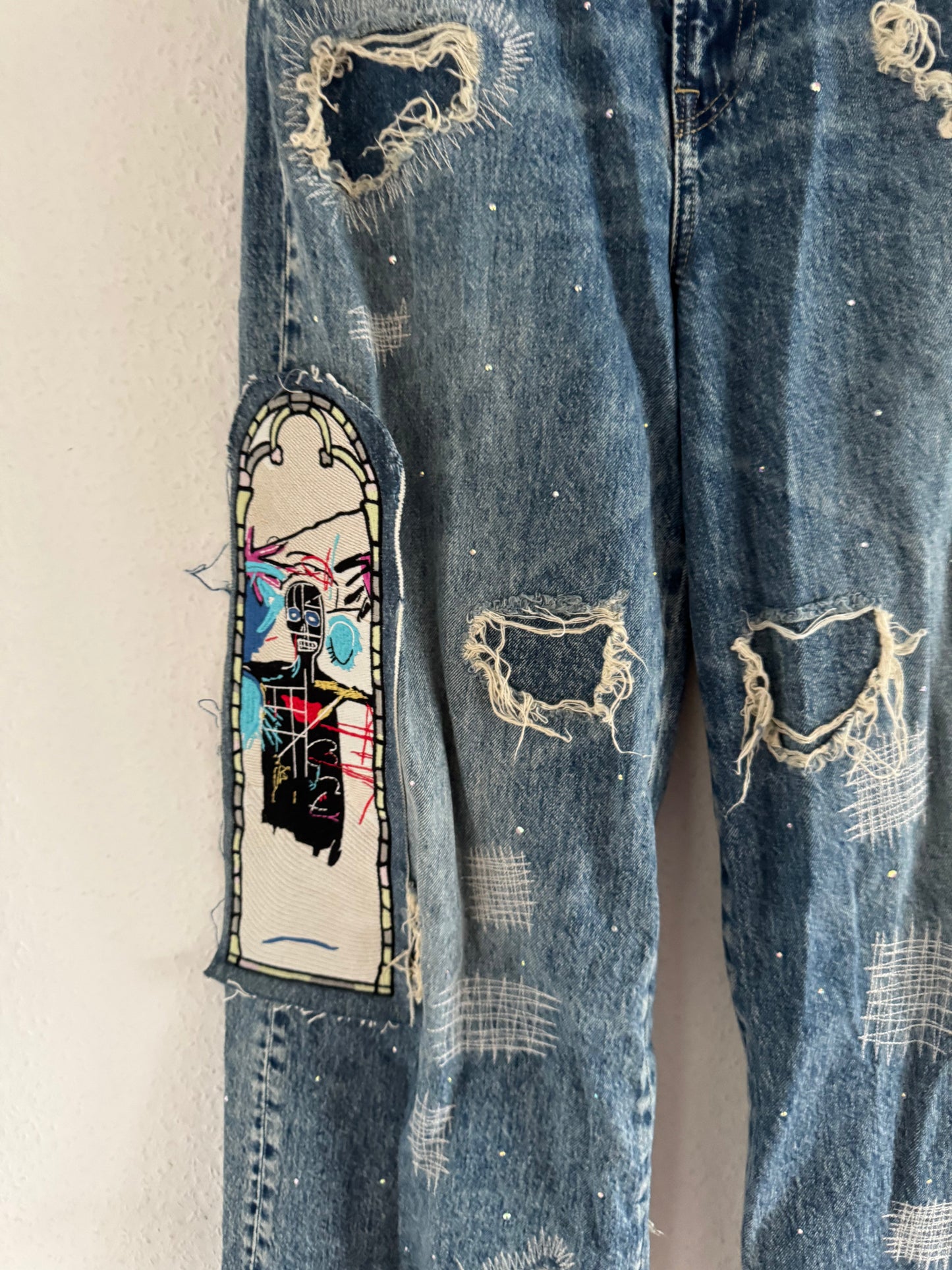 H&M × Jean-Michel Basquiat × Who Decides War Distressed Rhinestone Graphic Denim Jeans