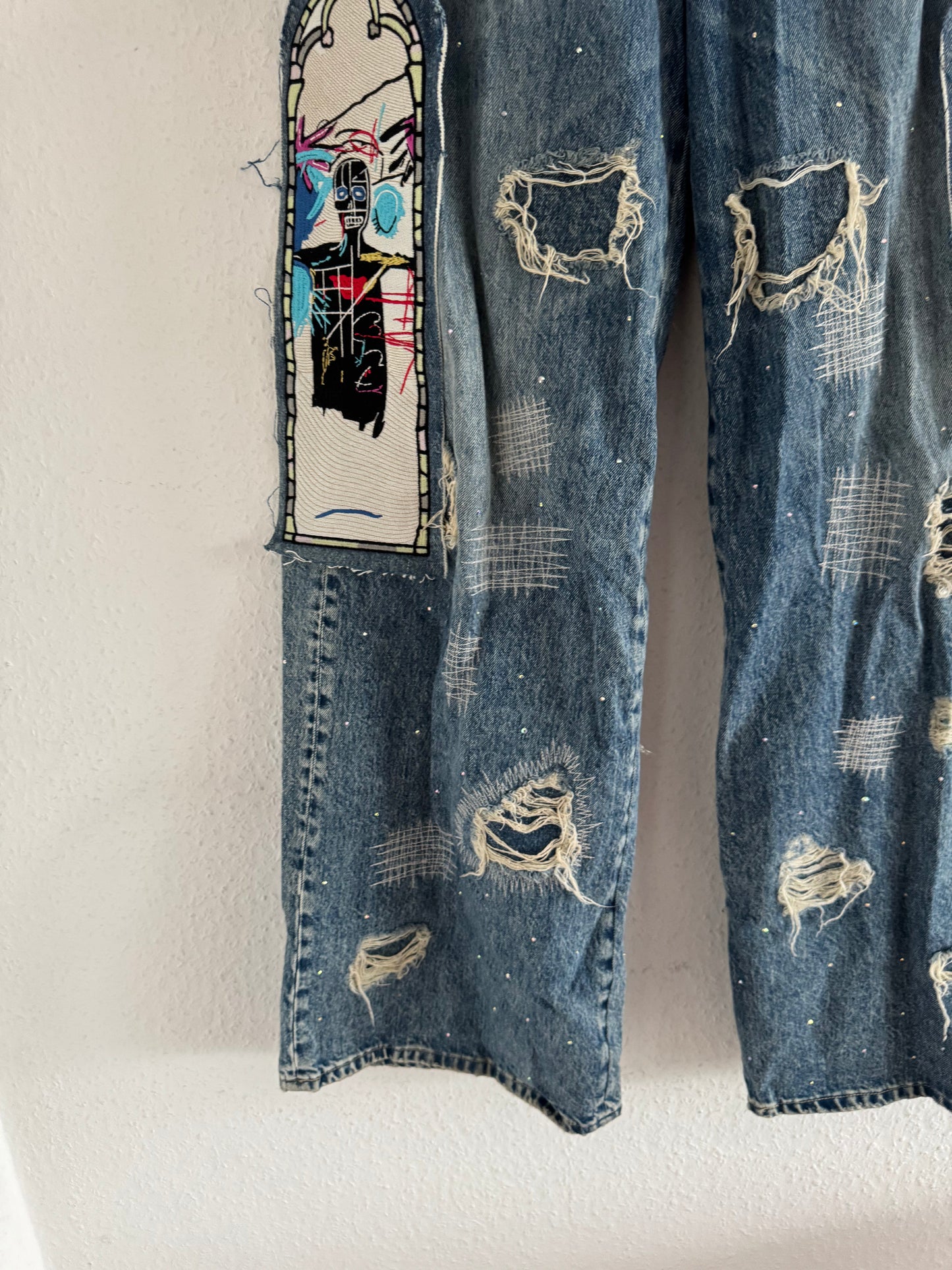 H&M × Jean-Michel Basquiat × Who Decides War Distressed Rhinestone Graphic Denim Jeans