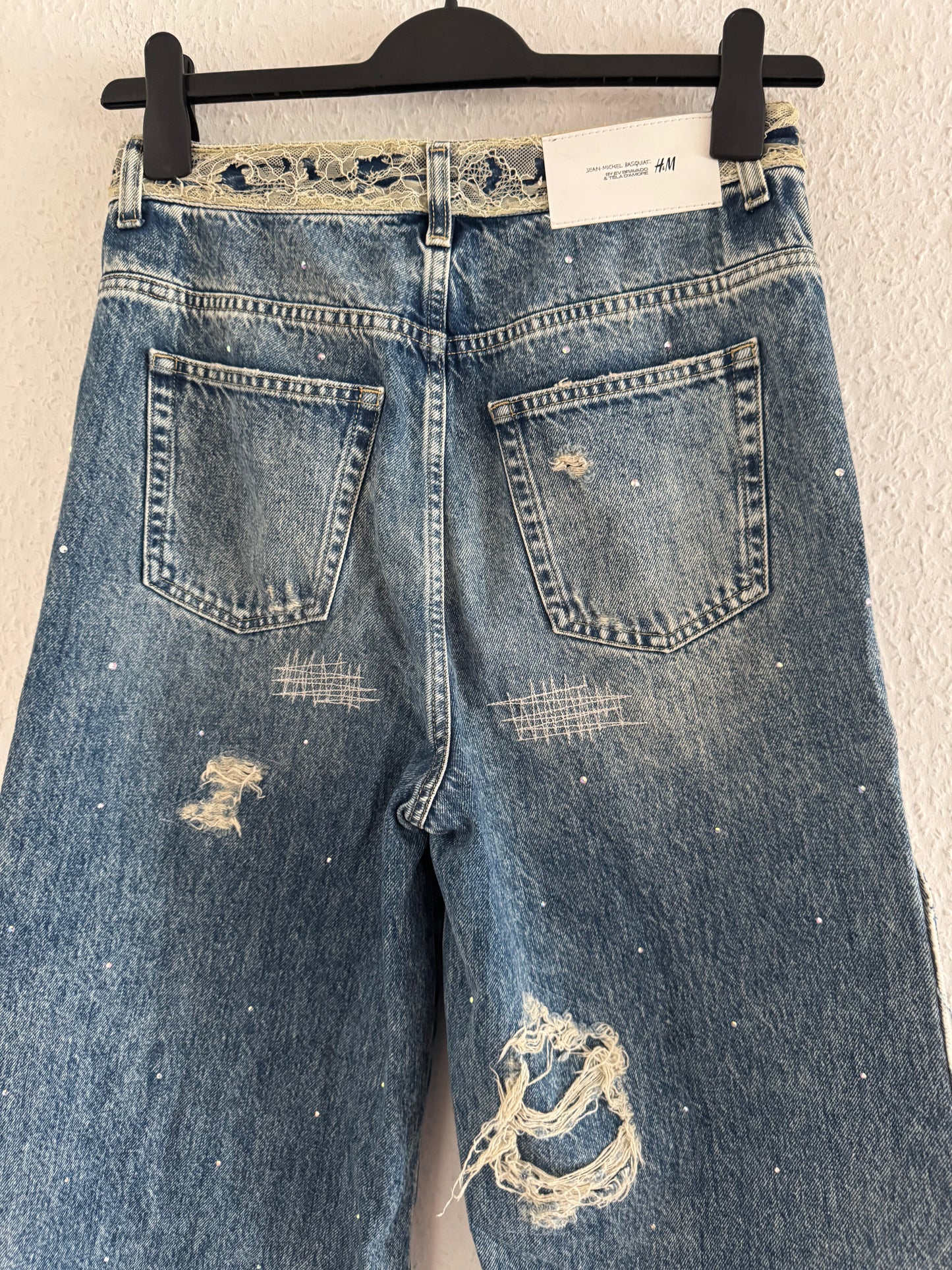 H&M × Jean-Michel Basquiat × Who Decides War Distressed Rhinestone Graphic Denim Jeans